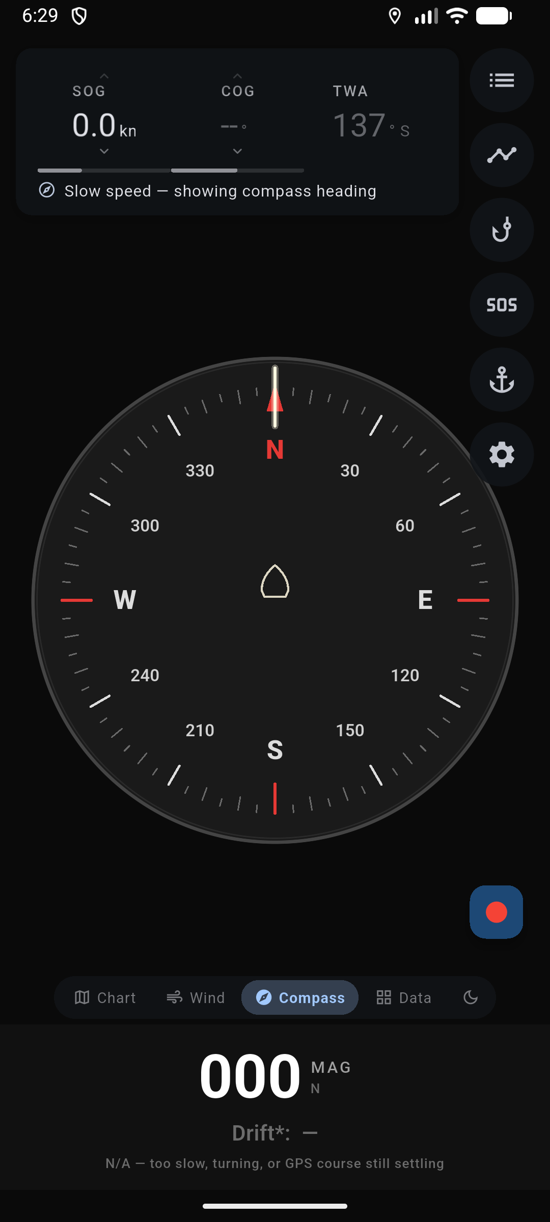 Full-screen magnetic compass: MAG digits, lubber at 12 o'clock, Chart / Wind / Compass / Data pill.